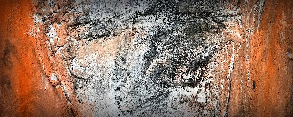 Close-up drawing in blood-red colour tones of a face.