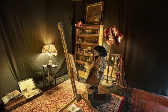 Male painter sculpture in his room